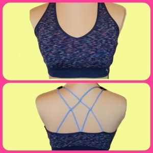 PUMA sports Bra. Strappy Back. Size L. Never worn.